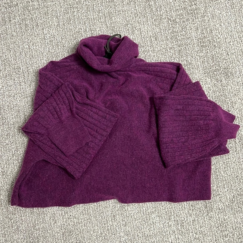 The Margot Sweater. It's ribbed throughout.